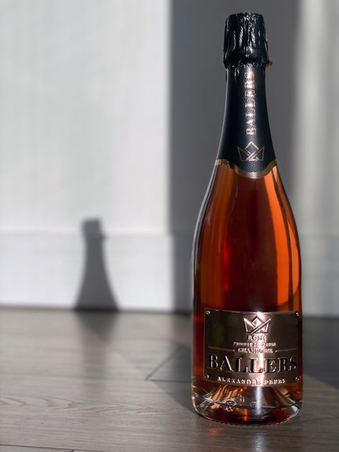 ROSE GOLD LABEL ROSÉ CHAMPAGNE IN THE SUN WITH SHADOWS